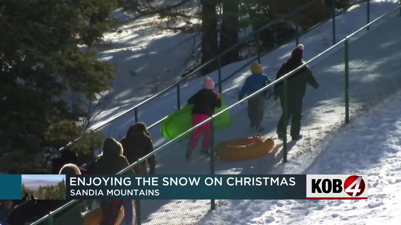 Metro residents enjoy White Christmas in Sandia Mountains